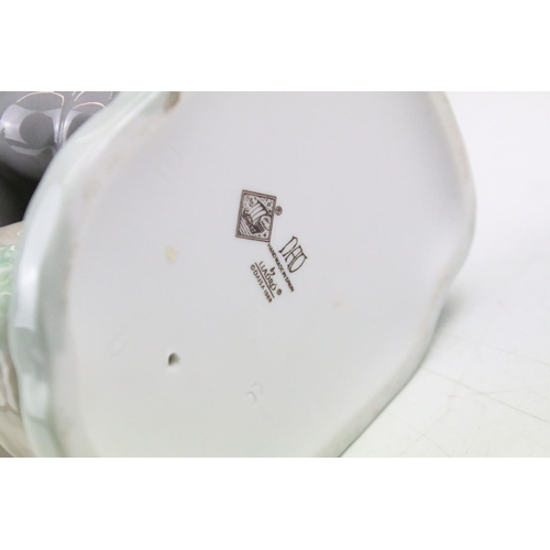 95 - Collection of 11 porcelain figures to include Lladro & Nao, featuring Lladro 4568 Shepherdess with D... 