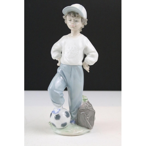 95 - Collection of 11 porcelain figures to include Lladro & Nao, featuring Lladro 4568 Shepherdess with D... 