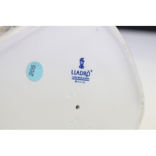 95 - Collection of 11 porcelain figures to include Lladro & Nao, featuring Lladro 4568 Shepherdess with D... 