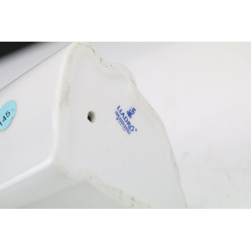 95 - Collection of 11 porcelain figures to include Lladro & Nao, featuring Lladro 4568 Shepherdess with D... 