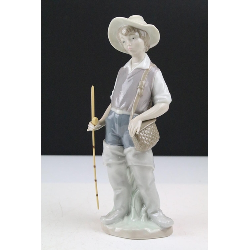 95 - Collection of 11 porcelain figures to include Lladro & Nao, featuring Lladro 4568 Shepherdess with D... 