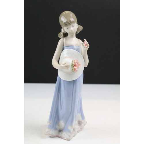 95 - Collection of 11 porcelain figures to include Lladro & Nao, featuring Lladro 4568 Shepherdess with D... 