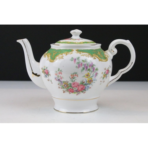 114 - Tuscan green ground floral tea ware to include 'Naples' and 'Windsor' pattern, featuring tea pot, su... 