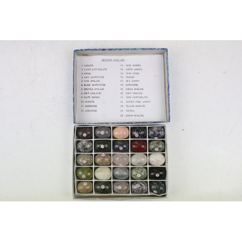 470 - A collection of 100 semi precious stone carved sample eggs housed within four boxes, together with a... 