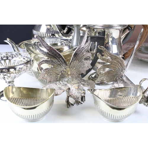 472 - Collection of silver plate and metal ware to include teapots, coffee pot, candlesticks, etc