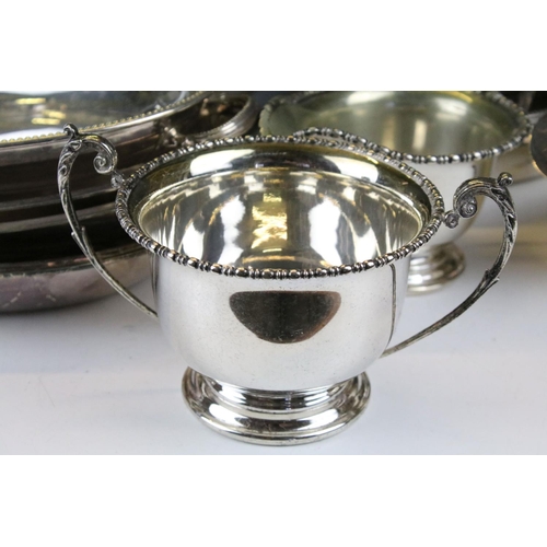 475 - Silver plated ware including an oversized 3 pcs tea service set, a pair of oval twin handled serving... 