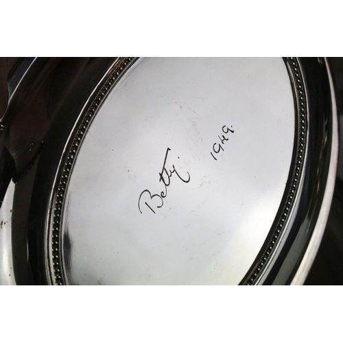 475 - Silver plated ware including an oversized 3 pcs tea service set, a pair of oval twin handled serving... 