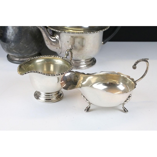 475 - Silver plated ware including an oversized 3 pcs tea service set, a pair of oval twin handled serving... 