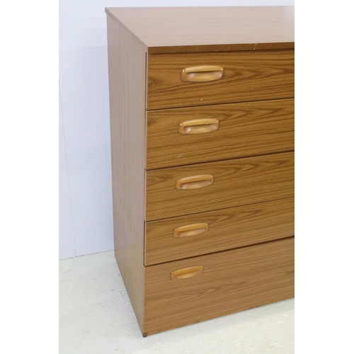 637 - Schreiber teak chest of five long drawers, with maker's label, 93.5cm high x 74.5cm wide x 43cm deep