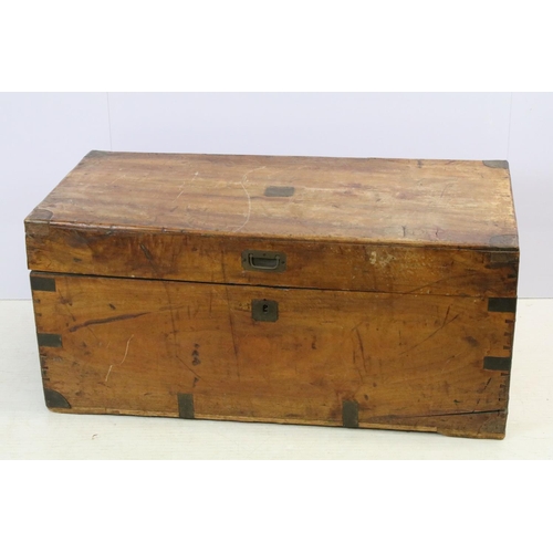 639 - 19th century teak campaign chest with brass mounts, brass recessed handle to front and two carrying ... 