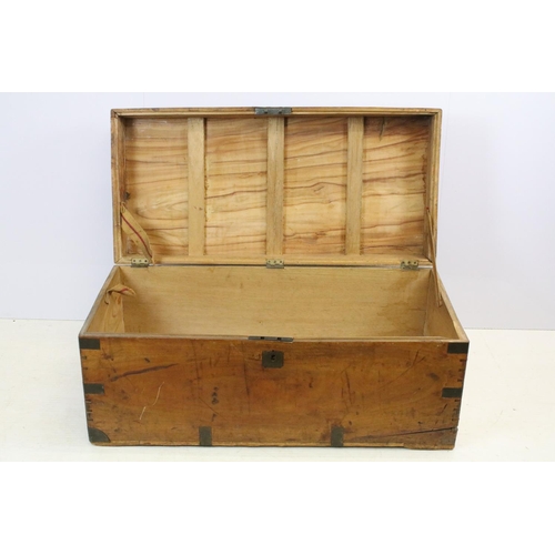 639 - 19th century teak campaign chest with brass mounts, brass recessed handle to front and two carrying ... 