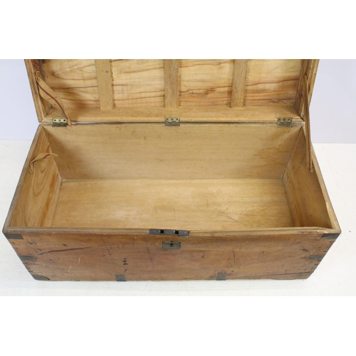 639 - 19th century teak campaign chest with brass mounts, brass recessed handle to front and two carrying ... 