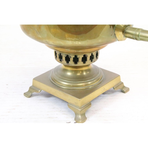 508 - Brass twin-handled samovar, with quatrefoil design pierced base, on four feet, Russian inscription a... 