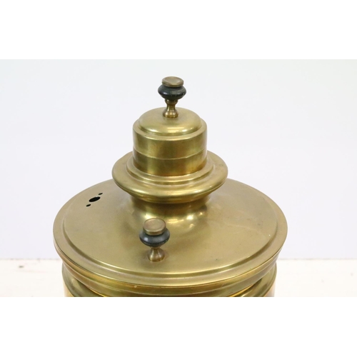 508 - Brass twin-handled samovar, with quatrefoil design pierced base, on four feet, Russian inscription a... 