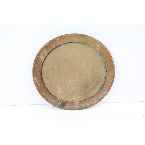 602 - Antique poker work circular wall mirror, the glass with bevelled edge, approx 38cm diameter