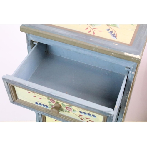 619 - Chest of seven drawers, painted with floral sprays, 96cm high x 27.5cm wide x 21cm deep