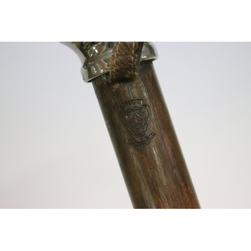 444 - Vintage wooden card display marked Gucci, with twin metal pommel ends, approx 83cm long