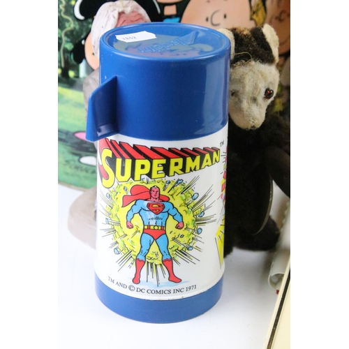 483 - Mixed collectables to include an early-to-mid 20th century clockwork toy with key, Peanuts bin, Supe... 