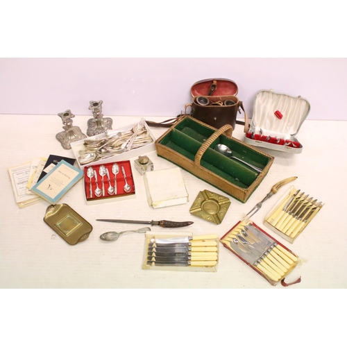 485 - Collection of silver plated flatware together with a pair of silver plated candlesticks, a quantity ... 