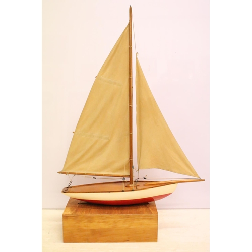 487 - Model sailing boat / pond yacht, with fitted wooden stand, 89cm high