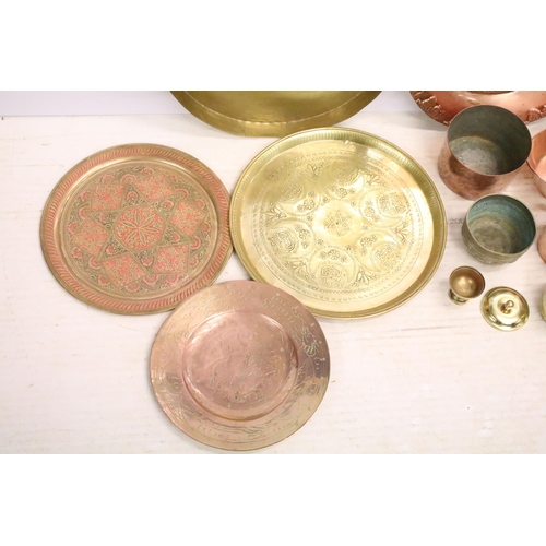 509 - Collection of brass & copper ware to include engraved Eastern trays, planters, etc
