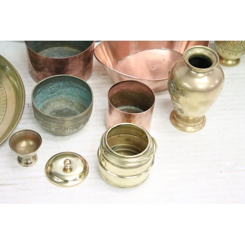 509 - Collection of brass & copper ware to include engraved Eastern trays, planters, etc