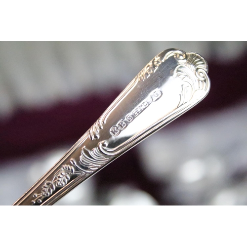 513 - K. Bright of Sheffield - An eight setting canteen of silver plated cutlery, together with a silver h... 