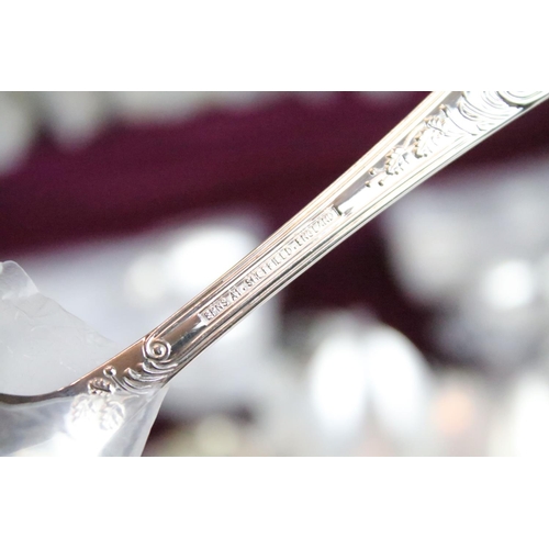 513 - K. Bright of Sheffield - An eight setting canteen of silver plated cutlery, together with a silver h... 