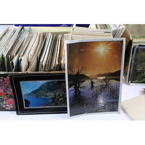 397 - Large collection of postcards housed within four boxes, early 20th century onwards, to include colou... 