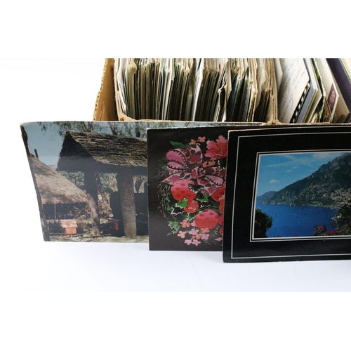 397 - Large collection of postcards housed within four boxes, early 20th century onwards, to include colou... 
