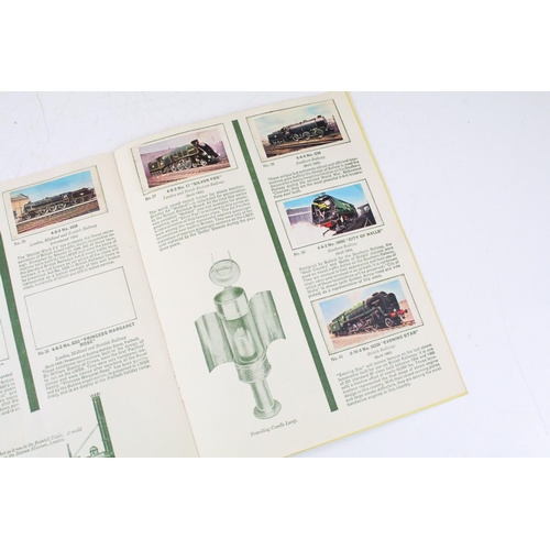 399 - Railwayana - A collection of vintage ephemera, books, booklets, cigarette cards (Wills+, 3 full sets... 