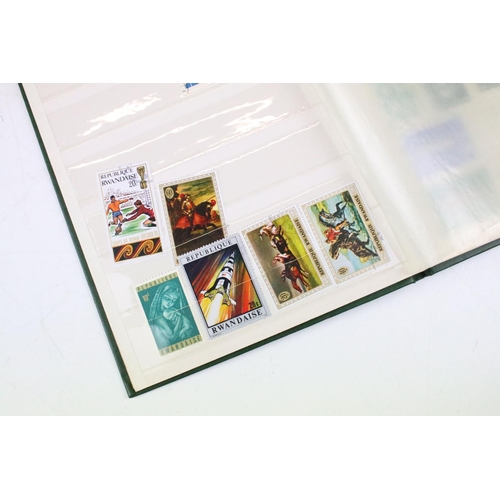 400 - Collection of Commonwealth & world stamps housed within eight albums / stock albums`, featuring a qu... 