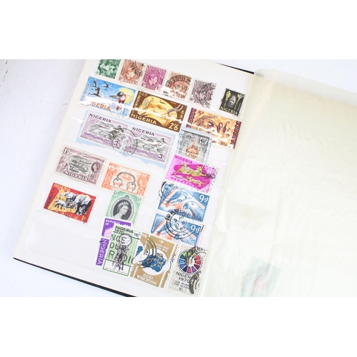 400 - Collection of Commonwealth & world stamps housed within eight albums / stock albums`, featuring a qu... 