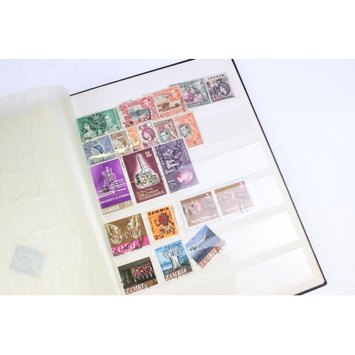 400 - Collection of Commonwealth & world stamps housed within eight albums / stock albums`, featuring a qu... 