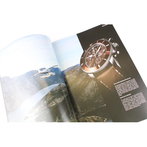 401 - Collection of 13 Rolex & Breitling watch catalogues, plus Breitling price lists, etc