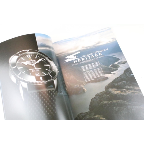 401 - Collection of 13 Rolex & Breitling watch catalogues, plus Breitling price lists, etc