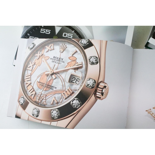 401 - Collection of 13 Rolex & Breitling watch catalogues, plus Breitling price lists, etc