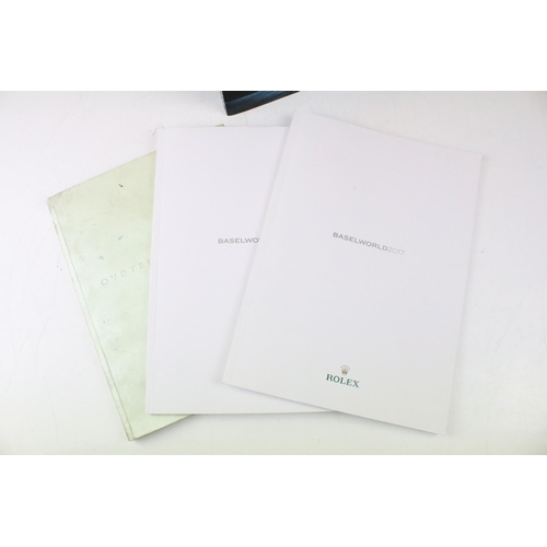 401 - Collection of 13 Rolex & Breitling watch catalogues, plus Breitling price lists, etc