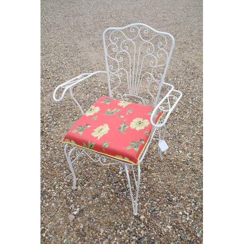 518 - White painted metal patio table set comprising a glass topped table with eight chairs and two glass ... 