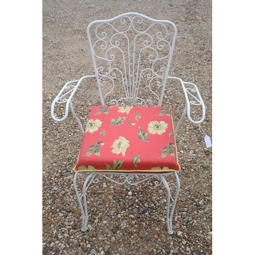 518 - White painted metal patio table set comprising a glass topped table with eight chairs and two glass ... 