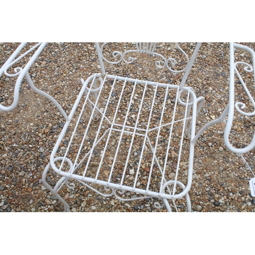 518 - White painted metal patio table set comprising a glass topped table with eight chairs and two glass ... 