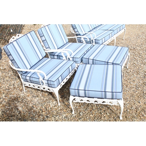 519 - White painted cast metal garden / patio sun lounger set comprising a twin seat (approx 123cm wide) a... 