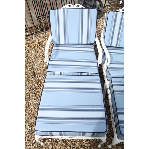 519 - White painted cast metal garden / patio sun lounger set comprising a twin seat (approx 123cm wide) a... 