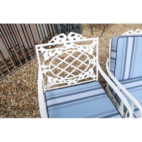 519 - White painted cast metal garden / patio sun lounger set comprising a twin seat (approx 123cm wide) a... 