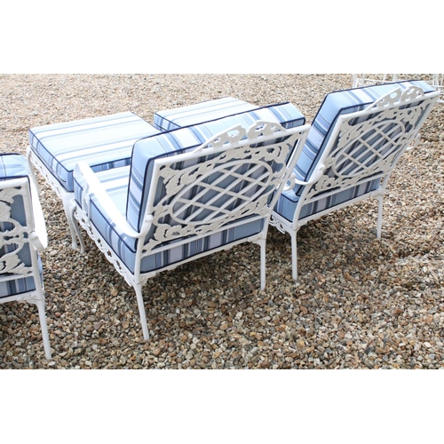 519 - White painted cast metal garden / patio sun lounger set comprising a twin seat (approx 123cm wide) a... 