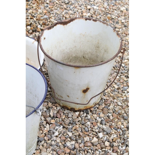 523 - Advertising - A cast iron Hudsons Soap dog water trough, together with a group of five enamel bucket... 