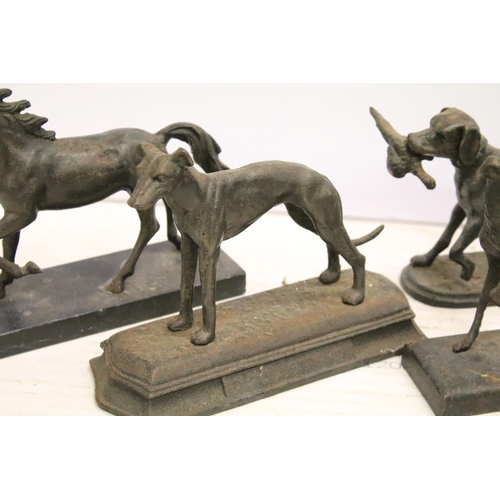 488 - Group of five cast iron dog ornaments and a horse example, tallest approx 18cm