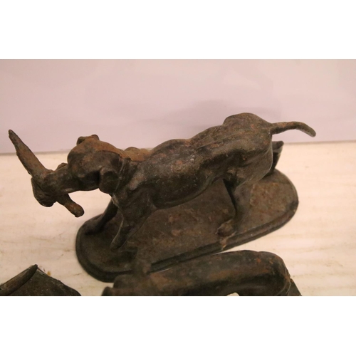 488 - Group of five cast iron dog ornaments and a horse example, tallest approx 18cm