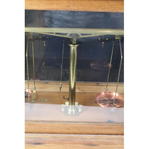 510 - Set of brass scales with copper pans, one depicting the Commonwealth Stadium, Edmonton, Alberta, hou... 