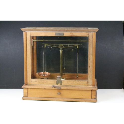 510 - Set of brass scales with copper pans, one depicting the Commonwealth Stadium, Edmonton, Alberta, hou... 